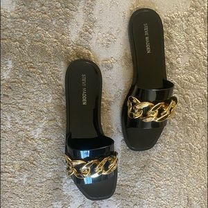 NWOT Steve Madden Black glossy slides with gold buckles size 7